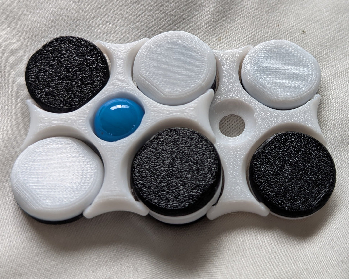 LodeStones:  Whorling magnetic fidgets (Solid/Split color variants!)